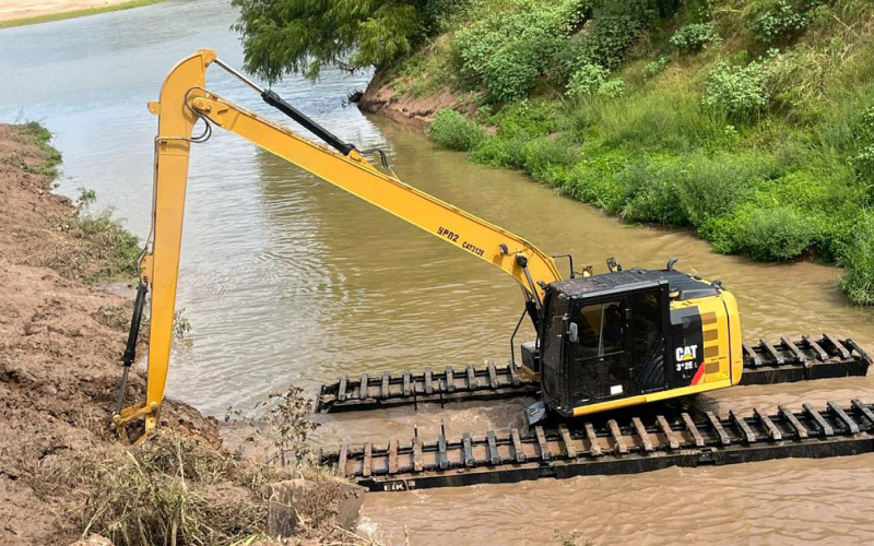 O'Shea Equipment amphibious excavator working on a wetland job site